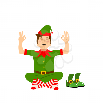 Christmas elf meditates. XMAS yoga. Assistant Santa Claus lotus posture. Little man in green suit. Character for new year
