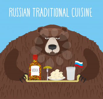  National Folk Food in Russia. Russian national cuisine. Bear with tray of traditional meal: vodka, dumplings and cucumber.