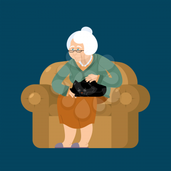 Grandmother and cat sitting on chair. granny cat lady. grandma and pet. old woman and animal. gammer and Beast
