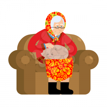 Russian Grandmother and cat. old woman in an armchair with pet. grandma from Russia in felt boots. Traditional national clothes
