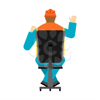 Machine operator sits on chair. Worker in helmet earning workshop.