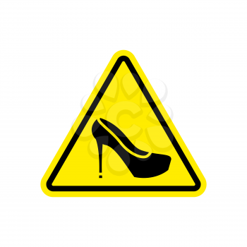 Attention woman. yellow prohibitory road sign women's shoes. 
