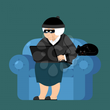 Grandmother hacker sits on an armchair with laptop and cat. grandma is thief programmer. internet Computer security. Old woman and PC