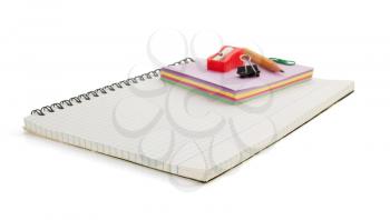 notebook and school supplies isolated on white background