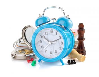 alarm clock and school supplies isolated on white background