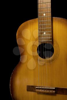 classical guitar isolated on black background