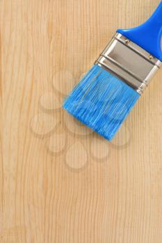 paintbrush on wood background texture