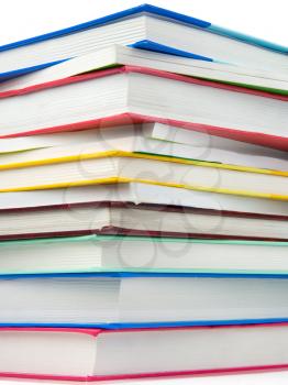 pile of new books isolated on white background
