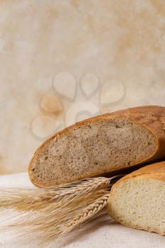 vertical image of loaf and grains