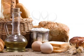 bread, oil, spike and other bakery products with eggs on sacking