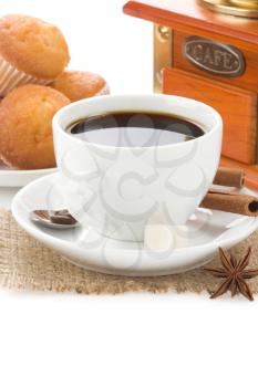 cup of coffee with beans and sweets isolated on white background