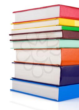 pile of new books isolated on white background