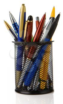 holder basket full of pens isolated on white background