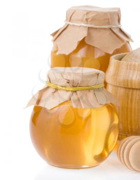 honey jar and pot isolated on white background