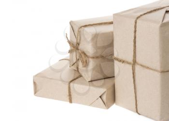 parcel wrapped with brown paper tied with rope isolated on white background