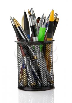 colorful pens in holder isolated on white background