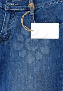 price tag over blue jeans textured pocket