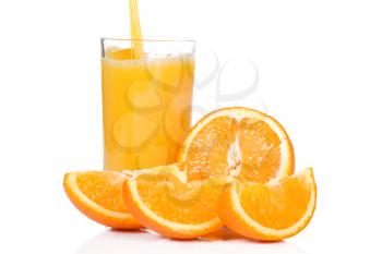 sliced orange and juice on white