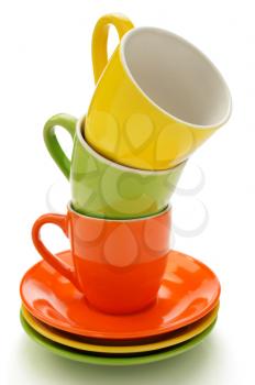 empty ceramic cup and saucer isolated on white background
