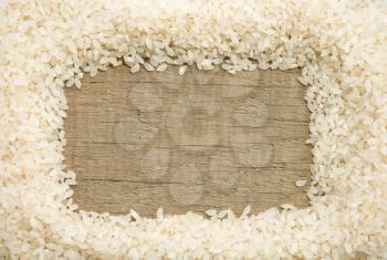 rice grain on wood background texture