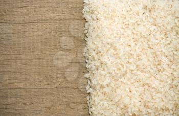 rice grain and wooden background texture