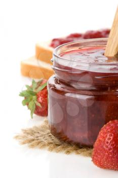 strawberry jam isolated on white background