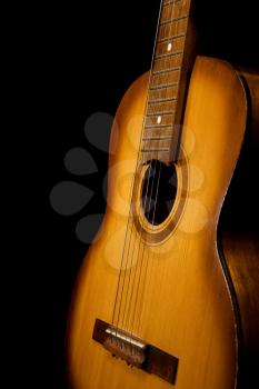 classical guitar on black background