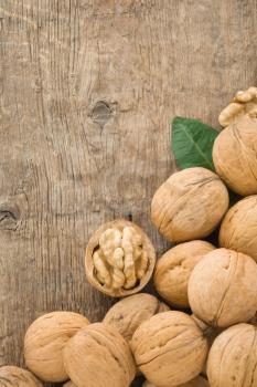 walnuts fruit on wood background texture