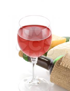 glass of red wine and cheese with reflection  isolated on white background