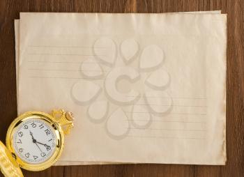watch at envelope on vintage sack background texture