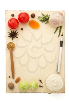 food ingredients and recipe paper on white background