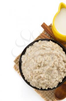 plate of oatmeal isolated on white background