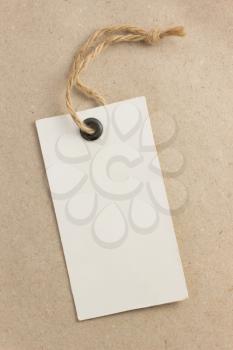 price tag label at paper textured background
