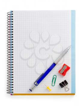 notebook and office accessories isolated on white background