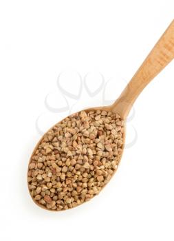 buckwheat in spoon isolated on white background
