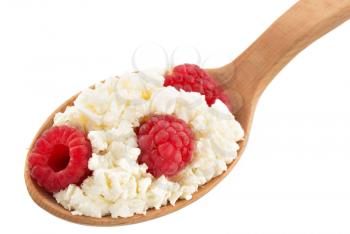 cottage cheese in spoon on white background