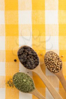food ingredients and spices on napkin background