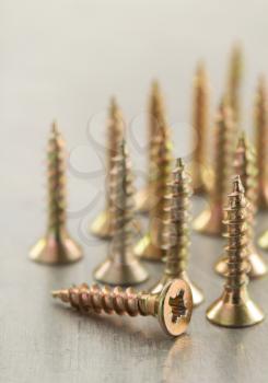 screws tool at metal background texture