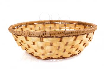 wicker plate isolated on white background