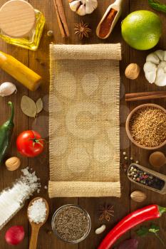 herbs and spices on wooden background