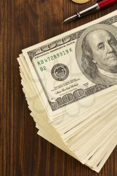 dollars money banknotes on wooden background