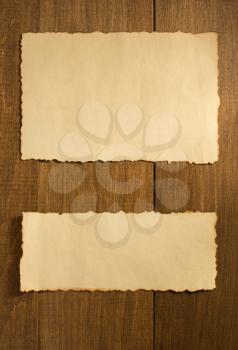 parchment old paper on wooden background