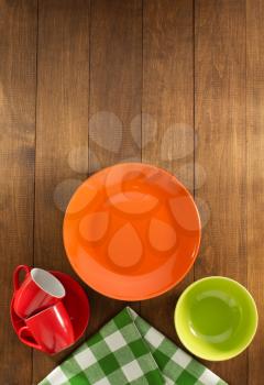 dishes set on wooden background
