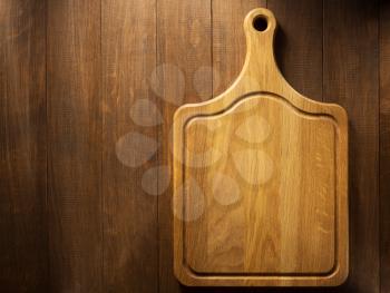 cutting board on wooden background texture