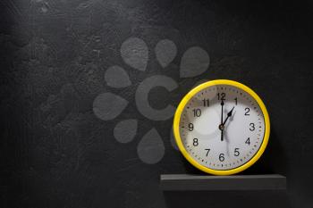 wall clock  at black background  texture