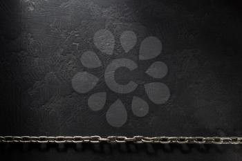 metal chain on black background
