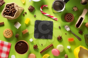 coffee, tea and cacao ingredients at colorful background