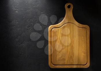 cutting board at black background texture
