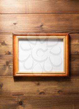 photo picture frame at wooden background texture