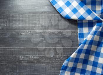 cloth napkin checked on wooden background